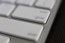Give key on a computer keyboard.