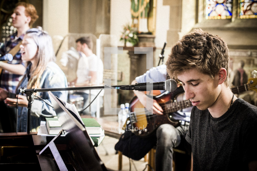 musicians playing in a church 