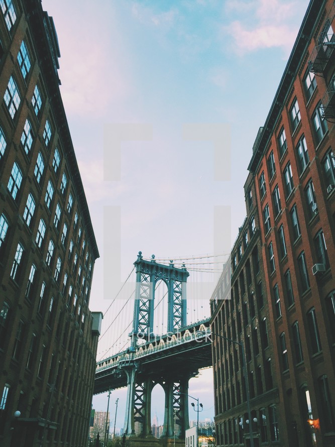 view of a bridge between two buildings in NYC