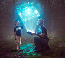 A father and son open up a new technological Bible and see a bright glowing blue display