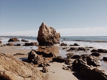 large rocks on a beach 