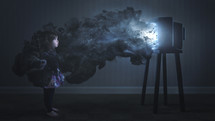 little girl watching tv enveloped in smoke 