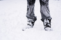 snow on pant legs and boots 