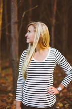 blonde woman posing outdoors 
