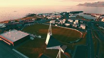 drone flying over soccer field and neighborhoods in Iceland 