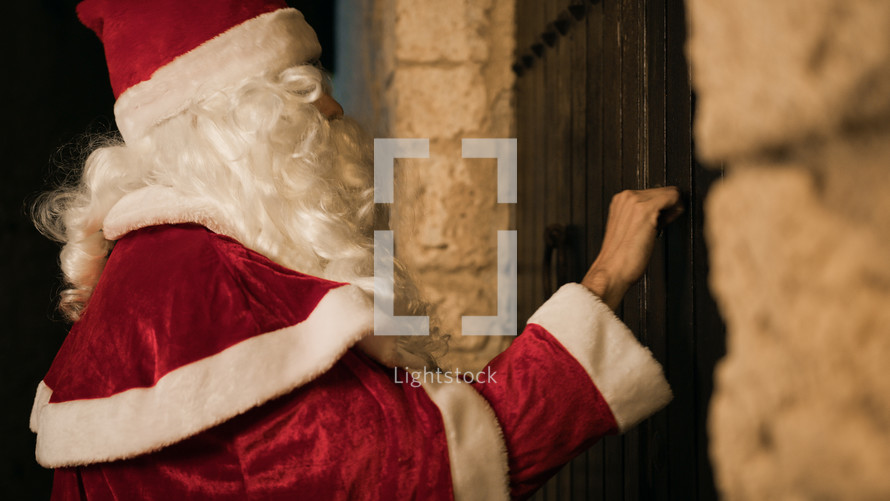 Santa Claus knocks on the door