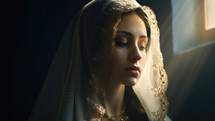 Portrait of a beautiful woman in a veil on a dark background