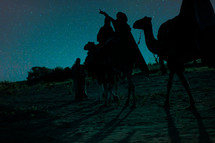 wisemen traveling on camels 
