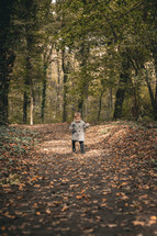 A child walking on a path