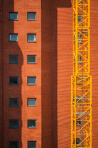 brick building and construction crane 