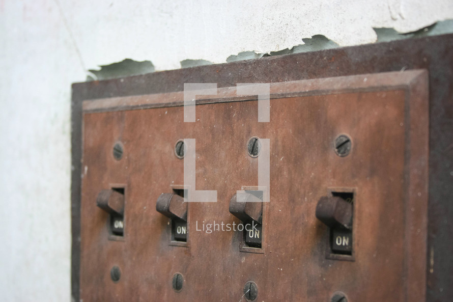rusty brown light switches 