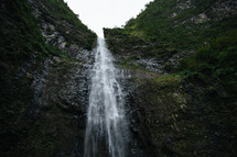 waterfall over the side of a cliff 