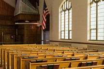 hymnals in church pews 