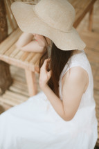 woman in a straw hat 
