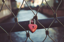 heart lock on a fence 