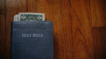 money in a Bible 