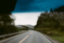 view of a roadway through a windshield in Norway 