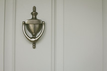 door knocker on a front door 