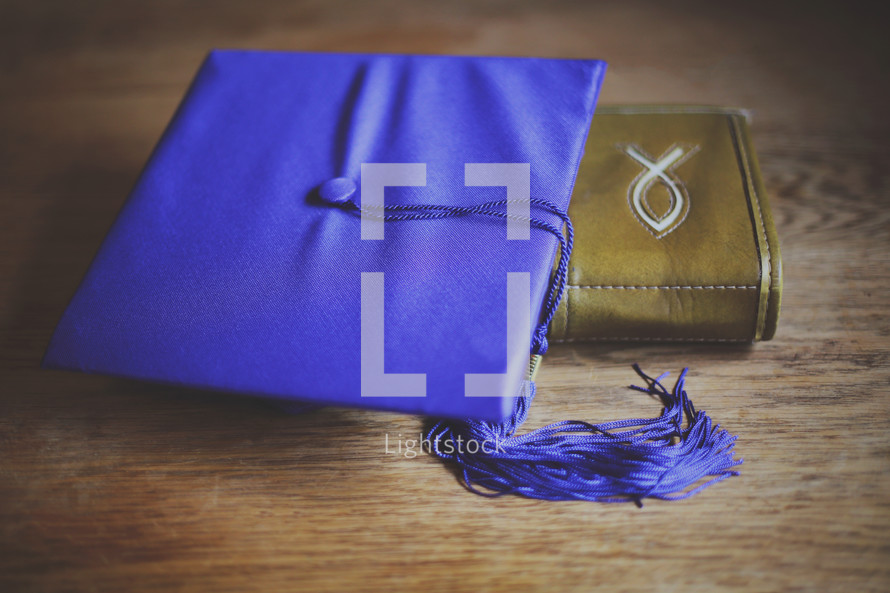 graduation cap and Bible