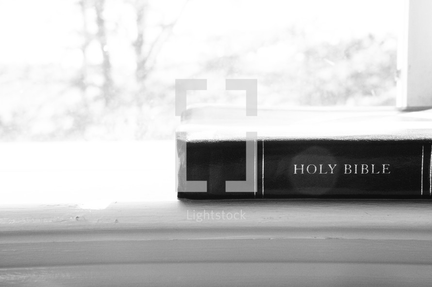 Bible in a window sill.