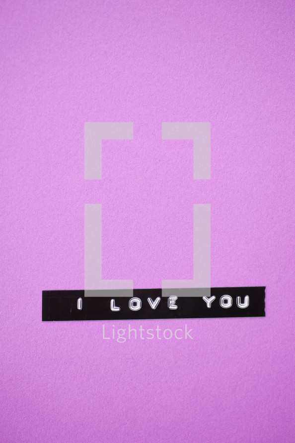 "I love you," on a purple background.