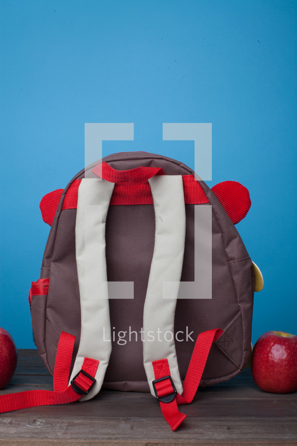 school book bag and apple 