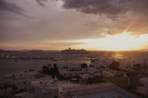 cruise ship in bay in Greece at sunset 