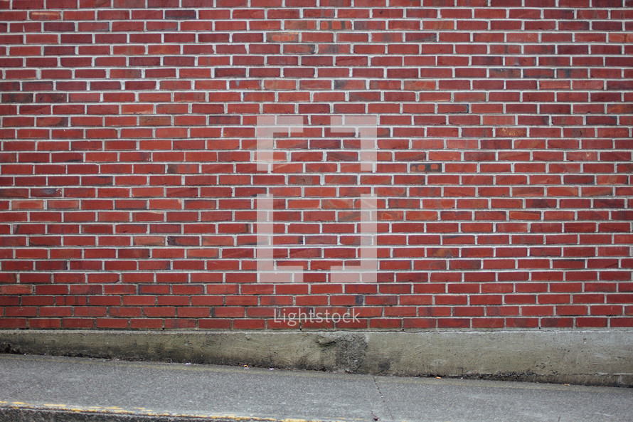 brick wall and sidewalk background 