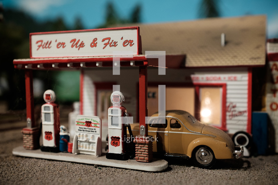 model car at a gas station 