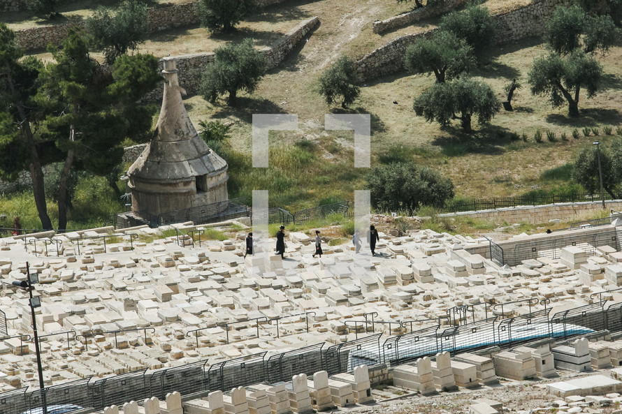 visitors at a cemetery in Jerusalem 