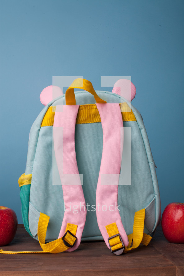 preschool book bag and apples