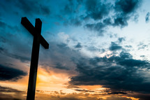 silhouette of a cross at sunrise