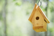 a wooden birdhouse 