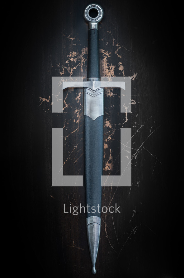 Sword on a grunge background with scratches