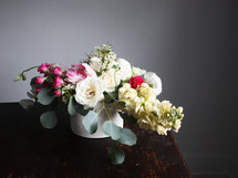 flower arrangement on a wood table 