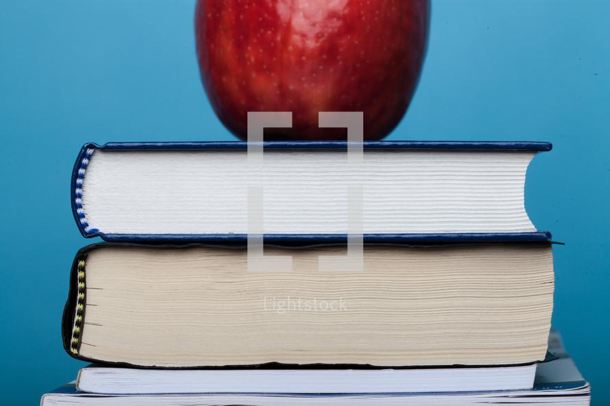 apples on a stack of books 