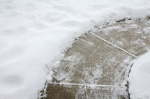 shoveled path in snow 