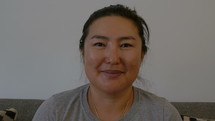 Close up of an Asian woman smiling