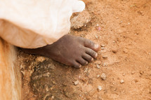 barefoot in the dirt