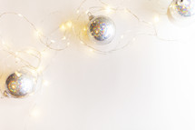 silver ornaments and fairy lights 