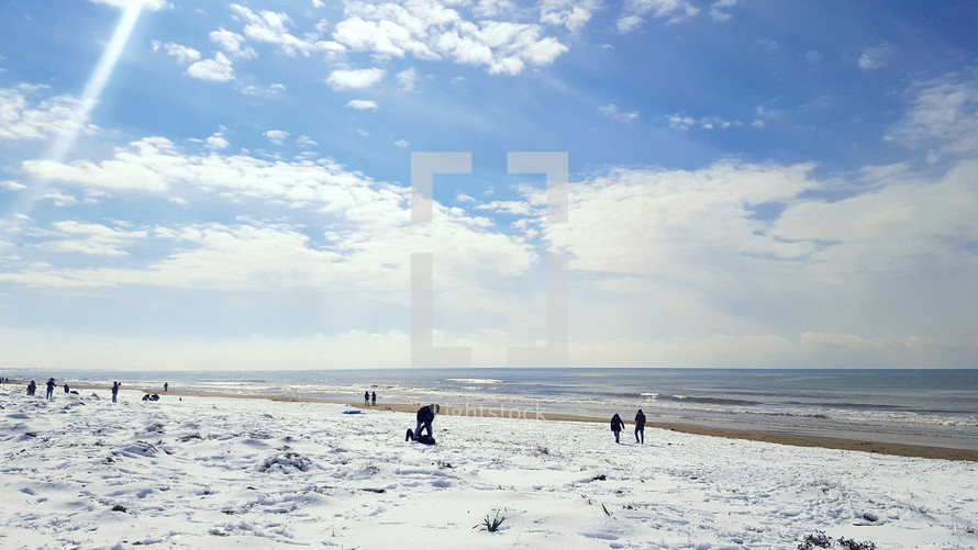 Landscape of the beach in winter time. white fluffy snow instead of yellow fine sand.
