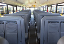 rows of seats in a school bus 