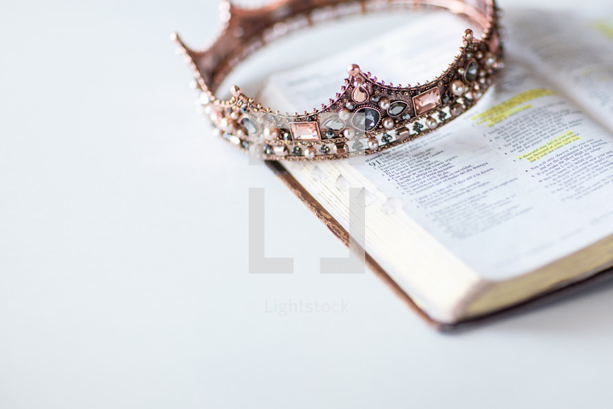 jeweled crown on the pages of a Bible 
