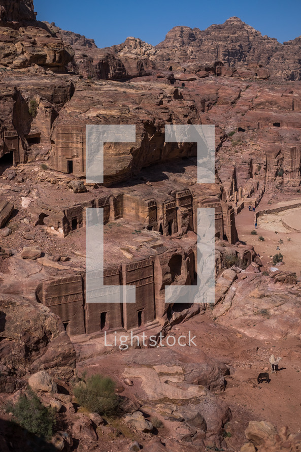 city carved into red rock 