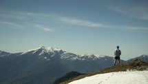 a man standing on a mountaintop 