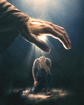 Jesus shines light from His hand onto a man alone in the darkness.