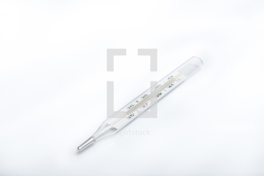 medical thermometer on white background with copy space