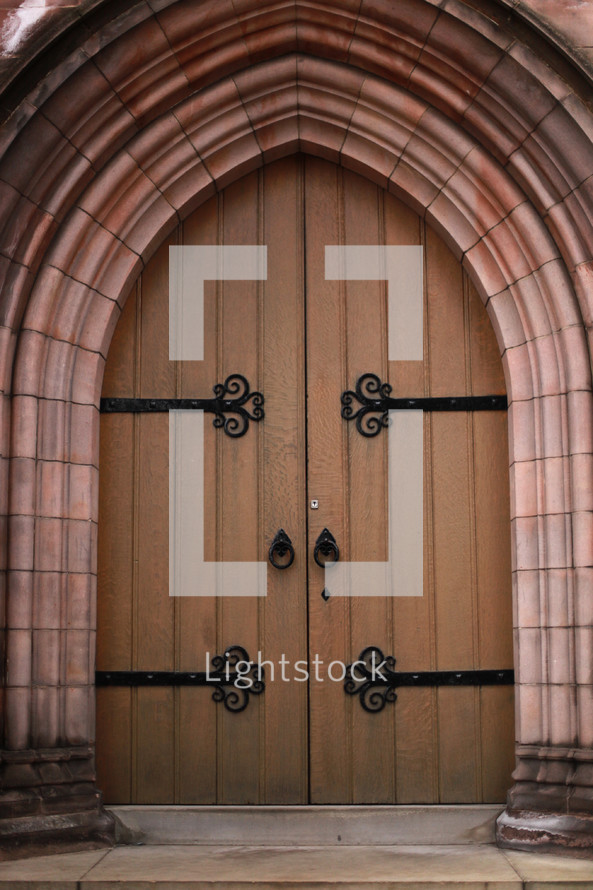 arched doors to a church 
