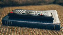 remote control on a Bible 
