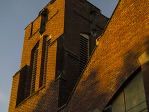 Tall, brick church building.